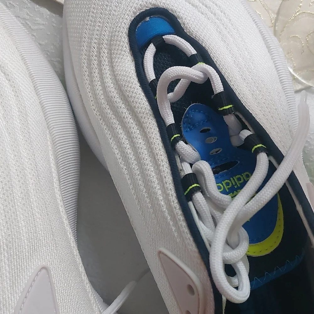 Adidas Adifom SLTN shoes in the Cloud White / SolarYellow / Blue Colorway